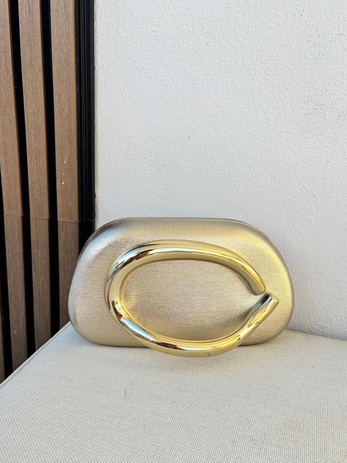 Cartera Paris dorada